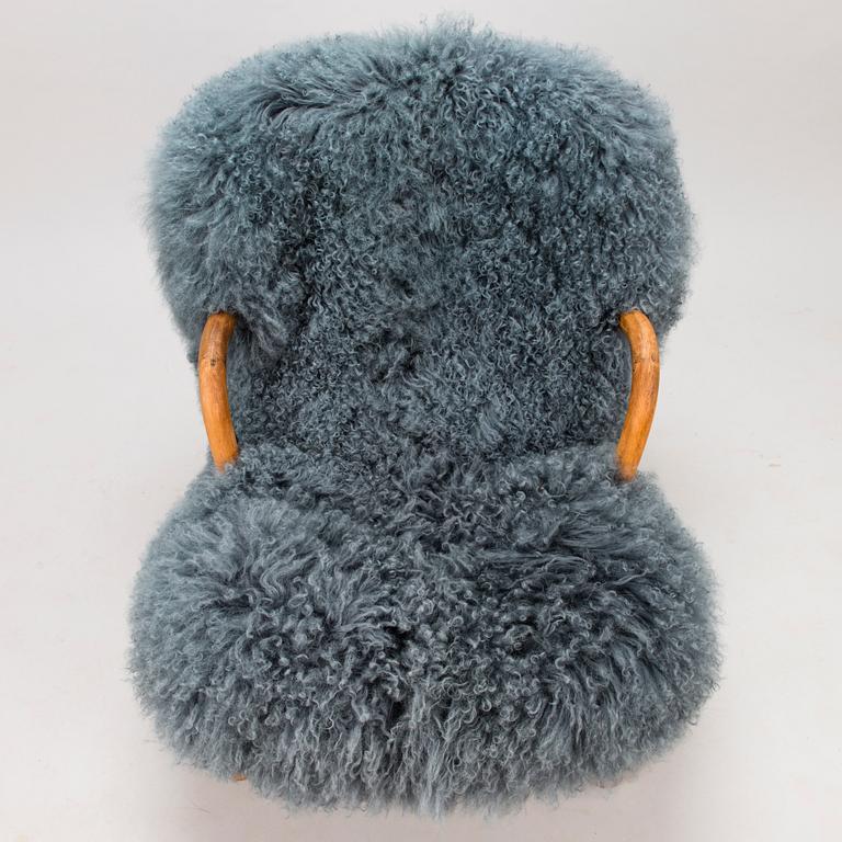 PHILIP ARCTANDER, attributed, 'Muslinge' Chiar /'Clam Chair'. model designed in 1941.