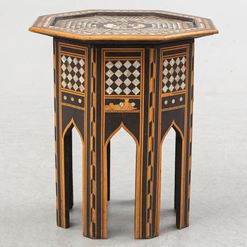 A mother of pearl and wood small table, 20th century.