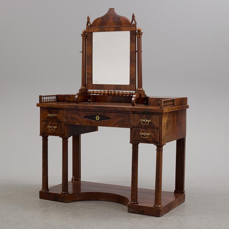 A  mahogany empire dressing 19th century table with mirror.