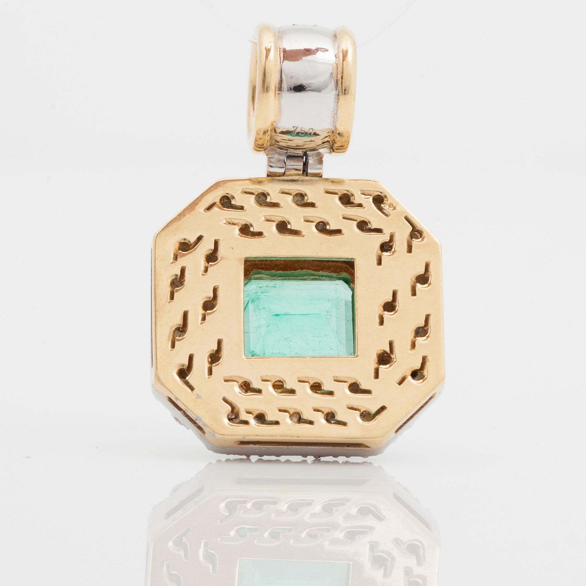 A pendant with a 5.50 ct emerald and cica 1.80 cts of brilliant cut diamonds.