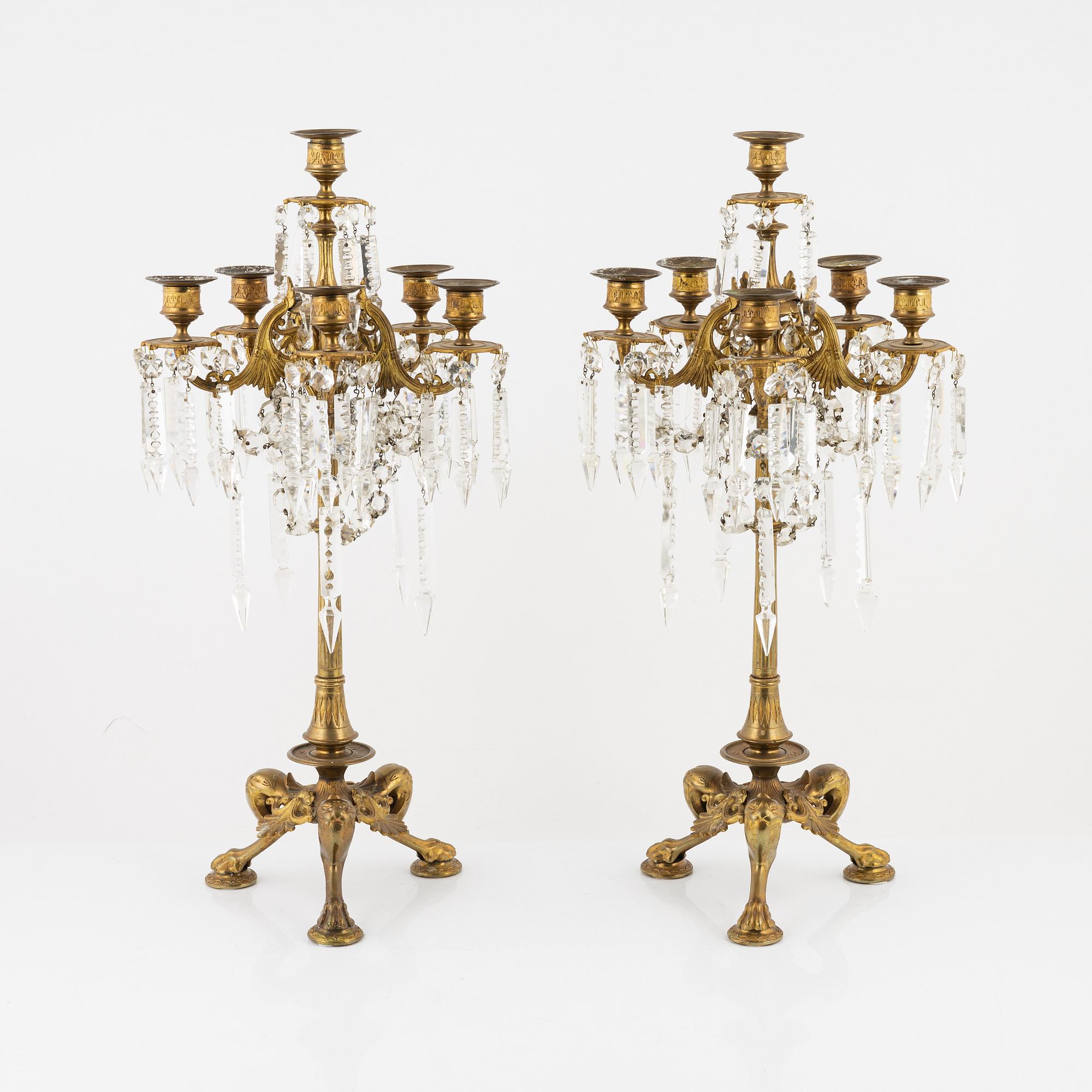 A pair of bronze candelabra, late 19th Century.