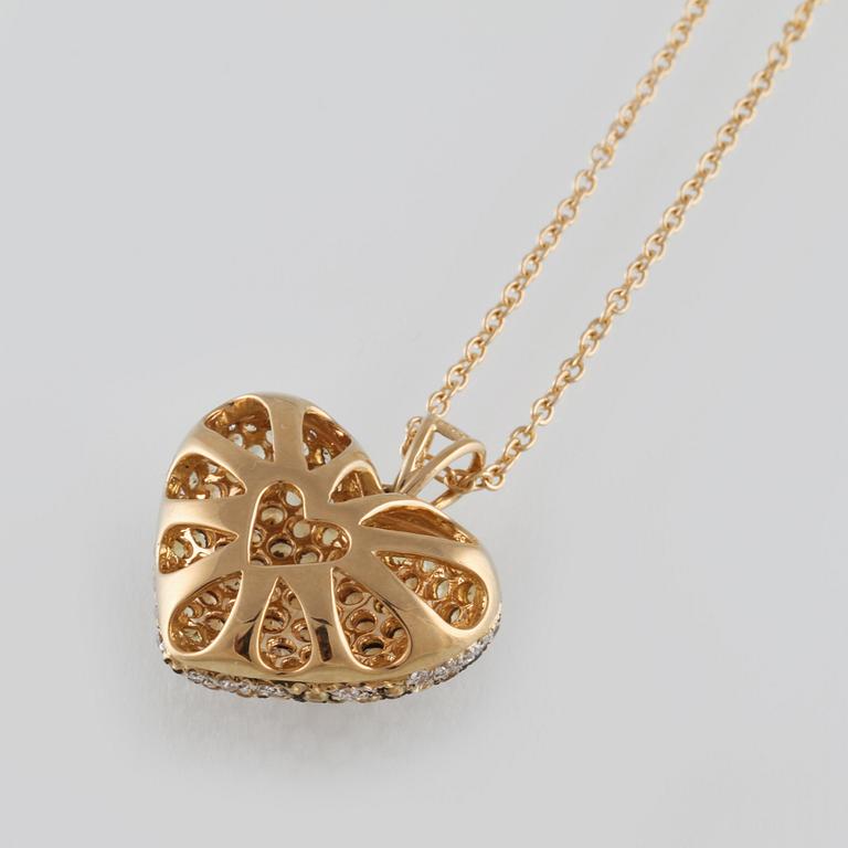 HÄNGE, 18K guld med briljantslipade diamanter ca 0.11 ct samt gula safirer ca 1.47 ct. Vikt 5,2 gram.