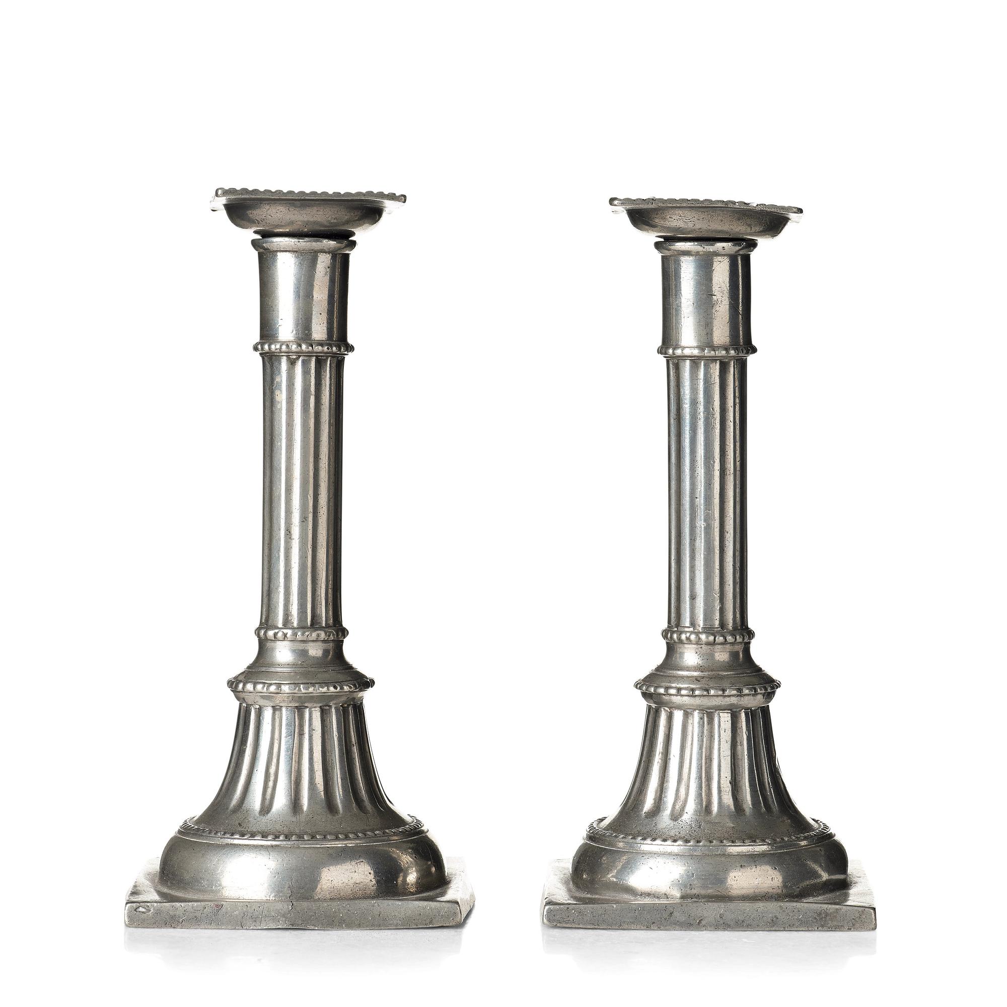 A pair of late Gustavian pewter candelsticks by Daniel Rising, Åbo 1797.