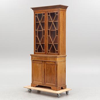 Display cabinet, circa 1900.