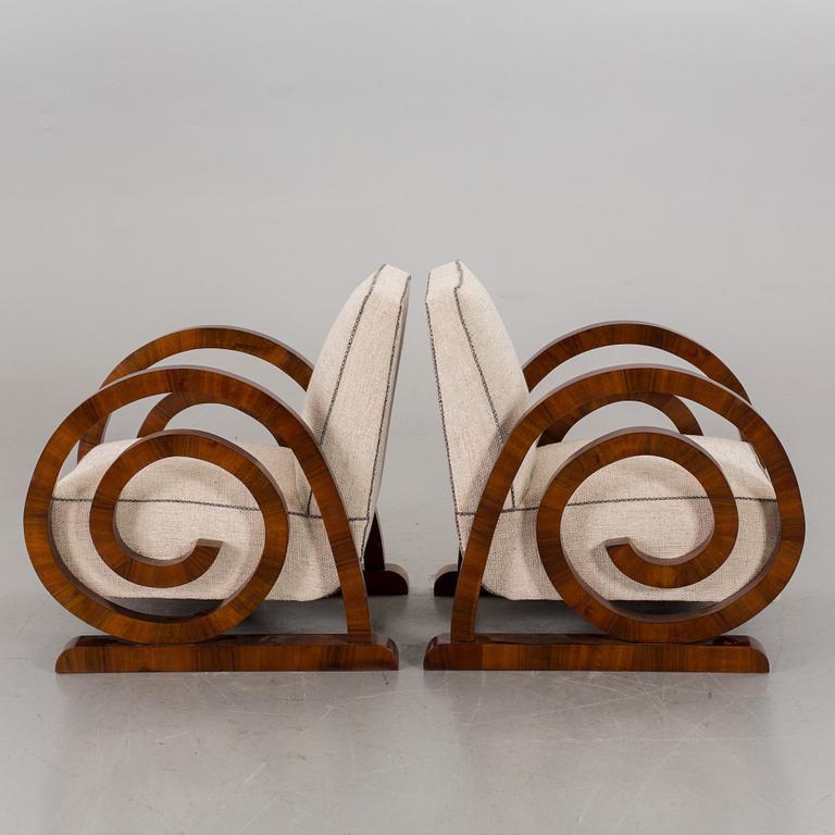 A pair of Art Deco armchairs.