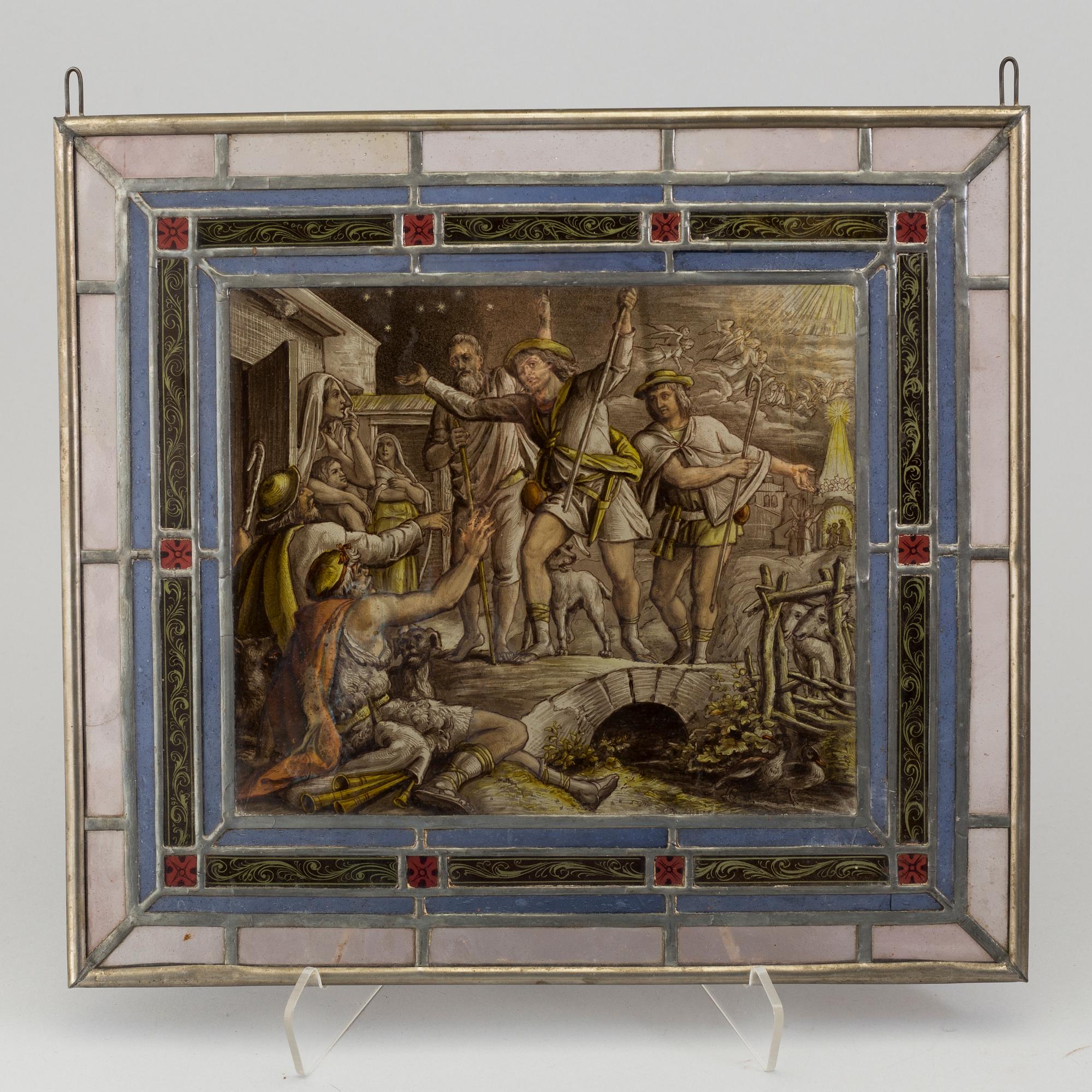 A pair of stained glass windows, circa 1900.