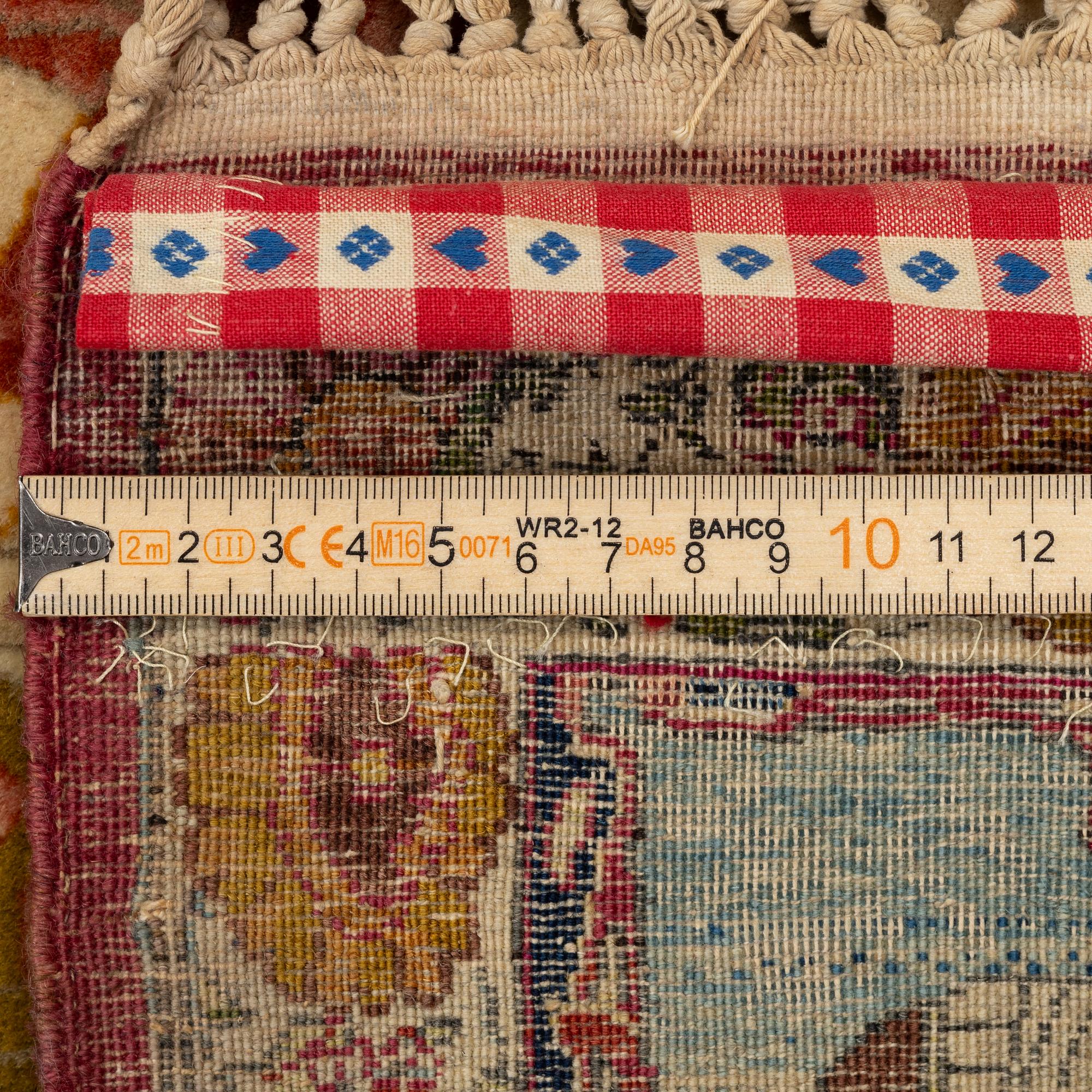 An antique Tabriz rug, Northwest Persia, c. 267 x 162 cm.