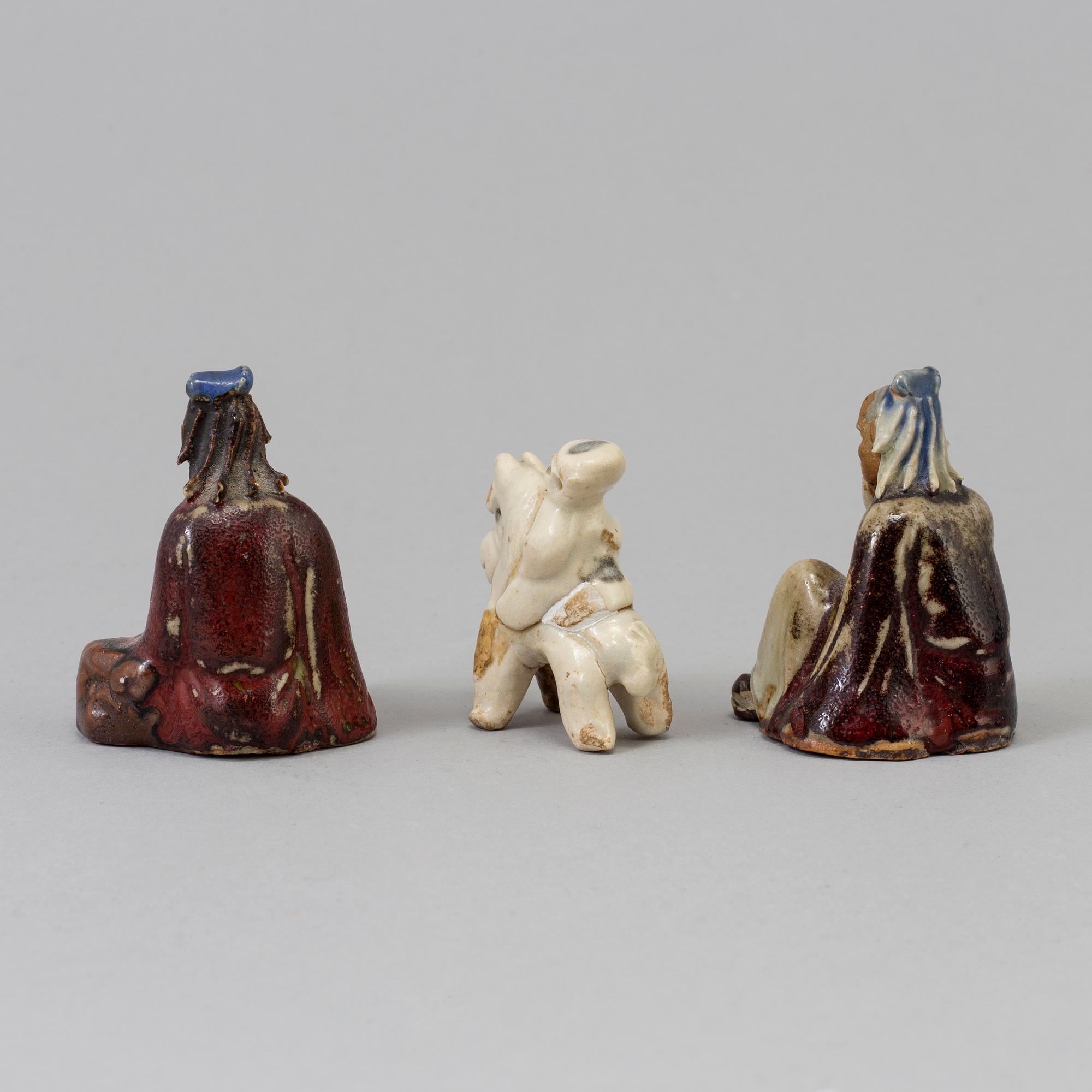 Three Chinese/South east asian ceramic miniature figurines, ca 1900 and older.