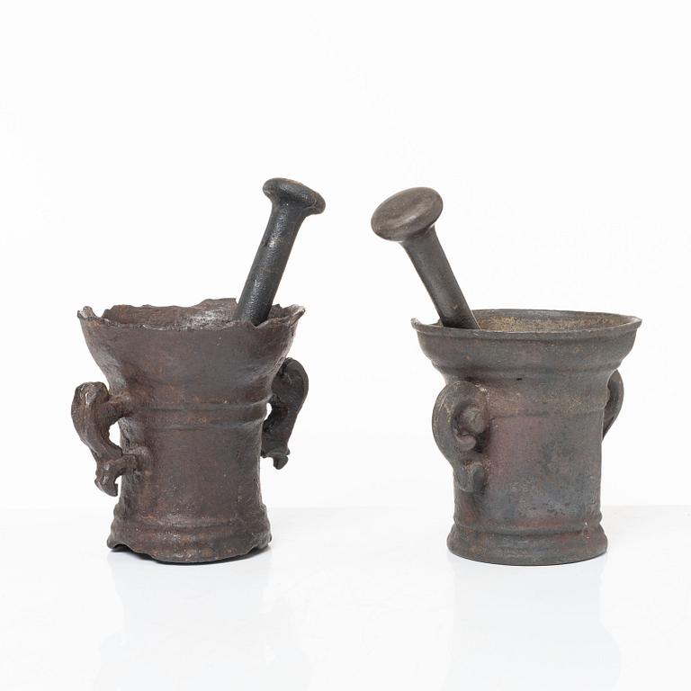 A set of two renaissance-type cast-iron mortars, 17th century.