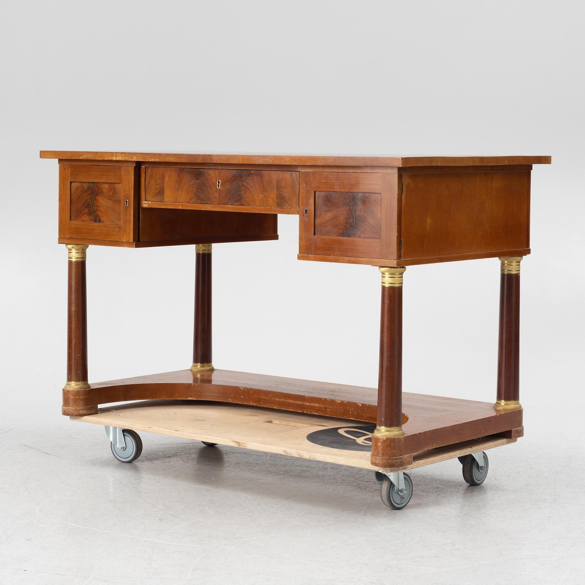 An Empire style desk, first half of the 20th Century.