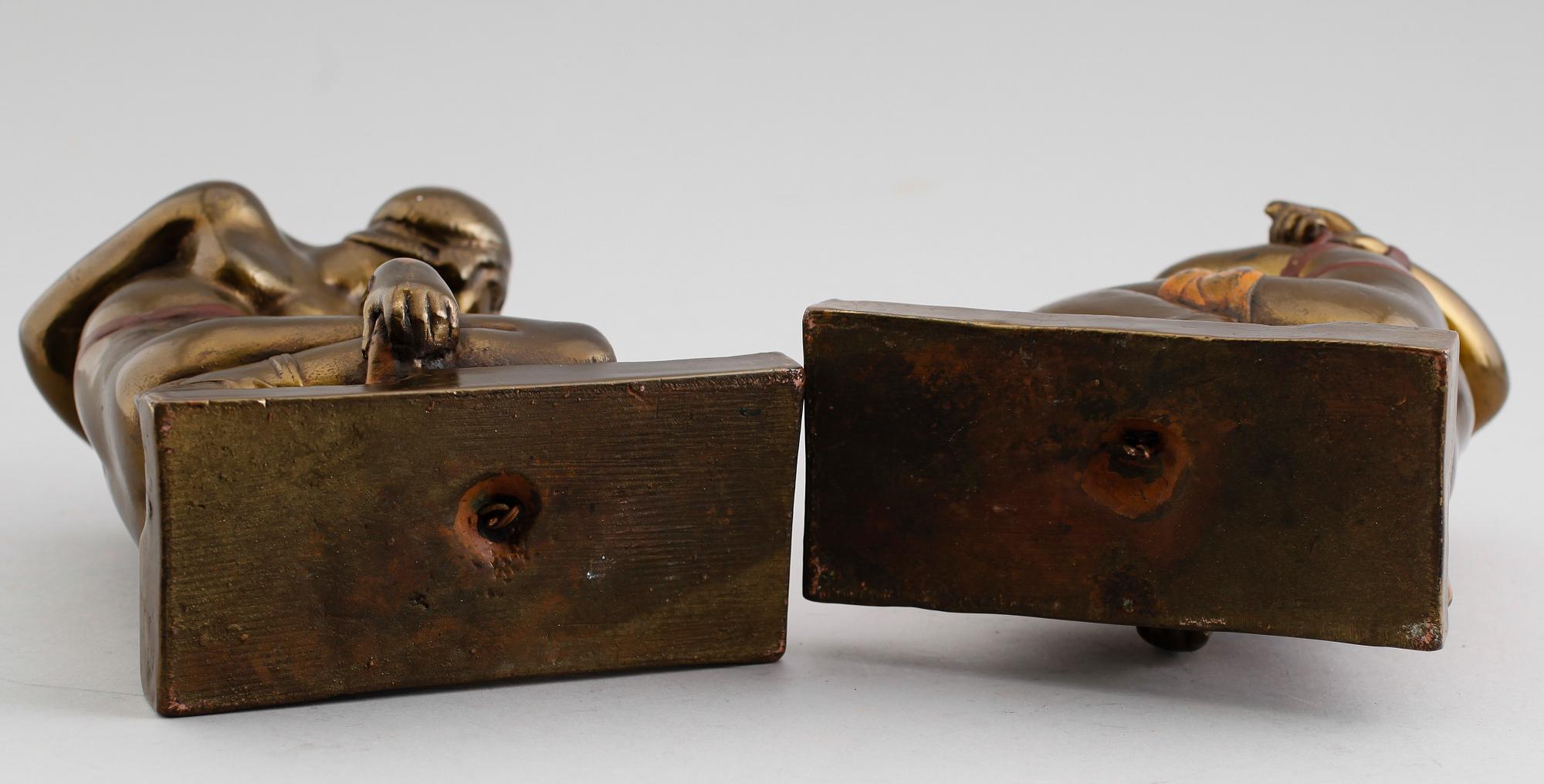 BOKSTÖD, 1 par, patinerad mässing, art déco, otydligt signerade, 1920/30-tal.