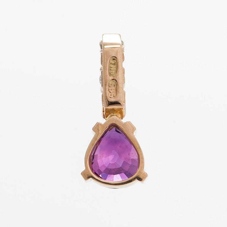 Riipus, 14K kultaa, pisarahiottu rubiini ja timantteja.