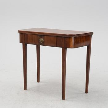 A mahognay card table, early 19th Century.