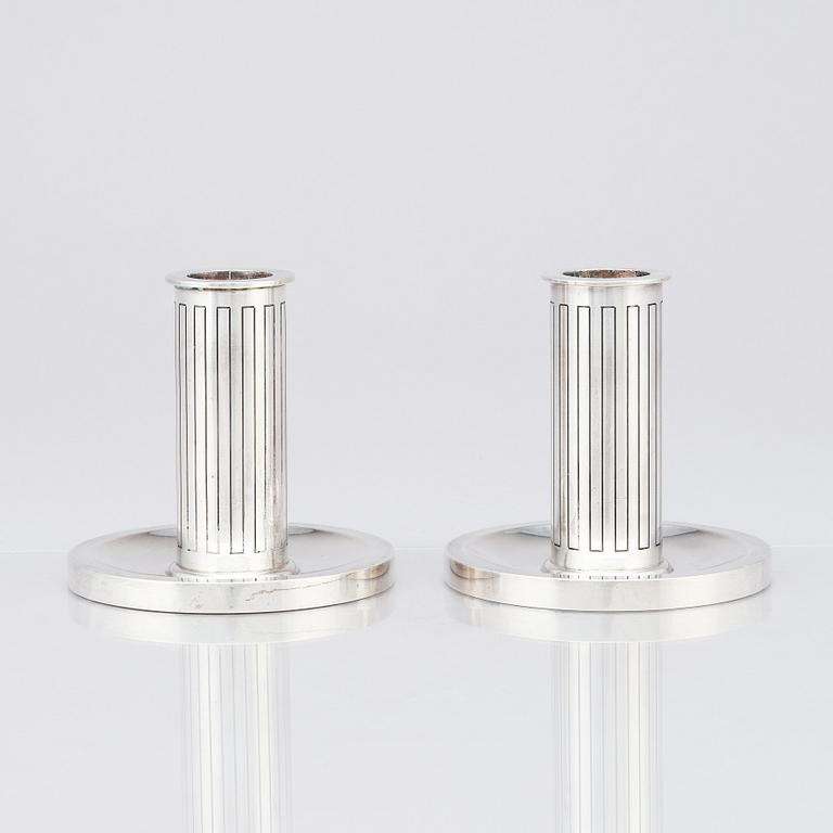 Sigvard Bernadotte, a pair of sterling candlesticks, Copenhagen 1945-1977, model nr 923.