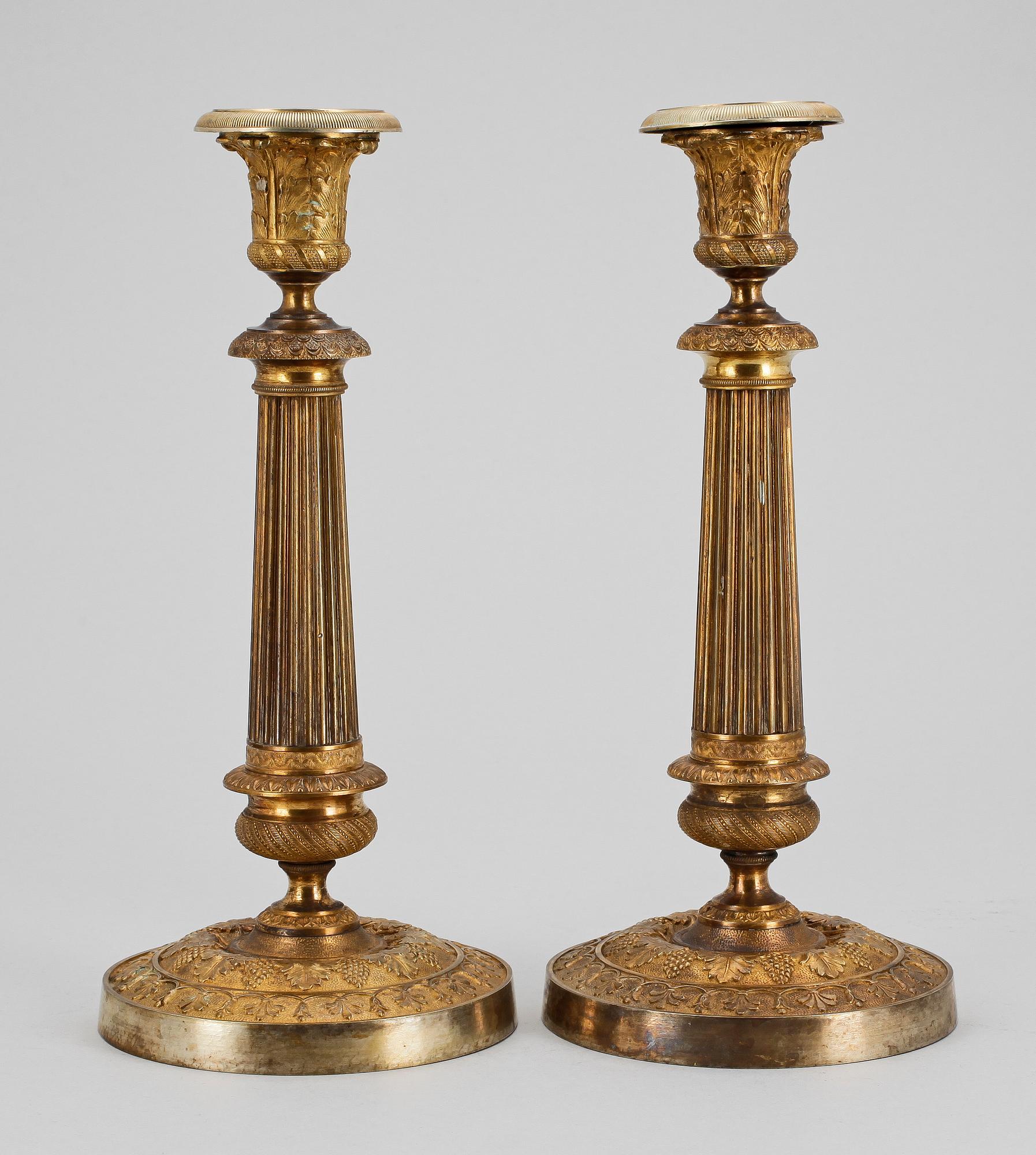 LJUSSTAKAR, ett par, mässing, empir, Frankrike. 1800-tal.