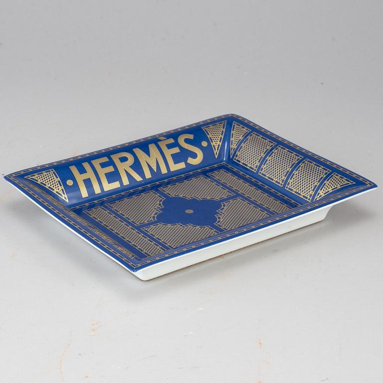 HERMÈS, a porcelain change tray.