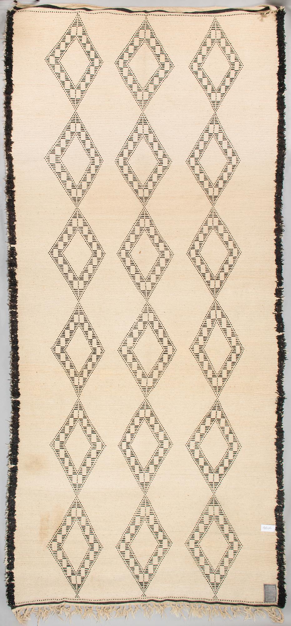 A Moroccan Beni Ourain carpet. circa 420x196 cm.