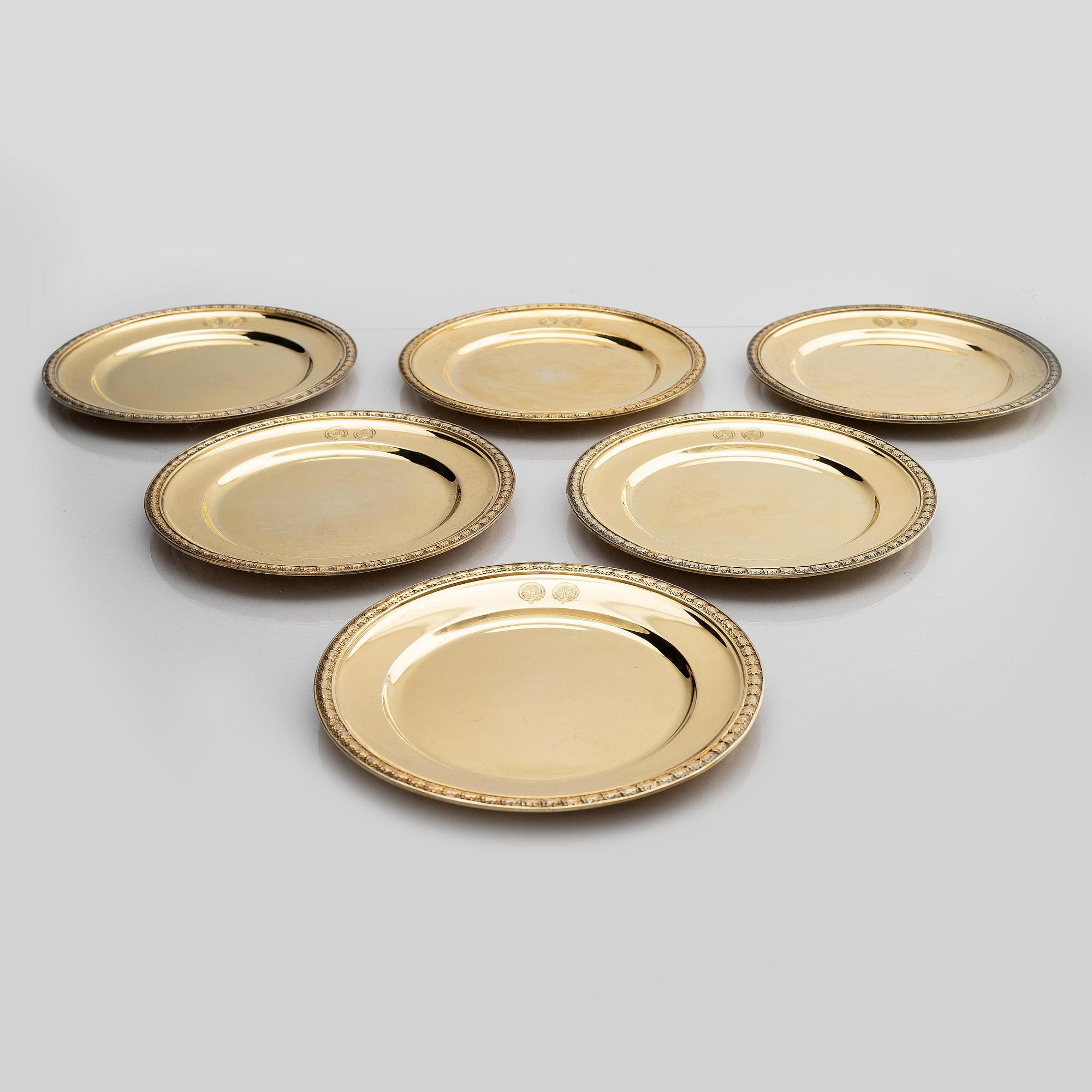 Twelve silver-gilt plates, mark of company C.G. Hallberg, Stockholm 1913-1917.