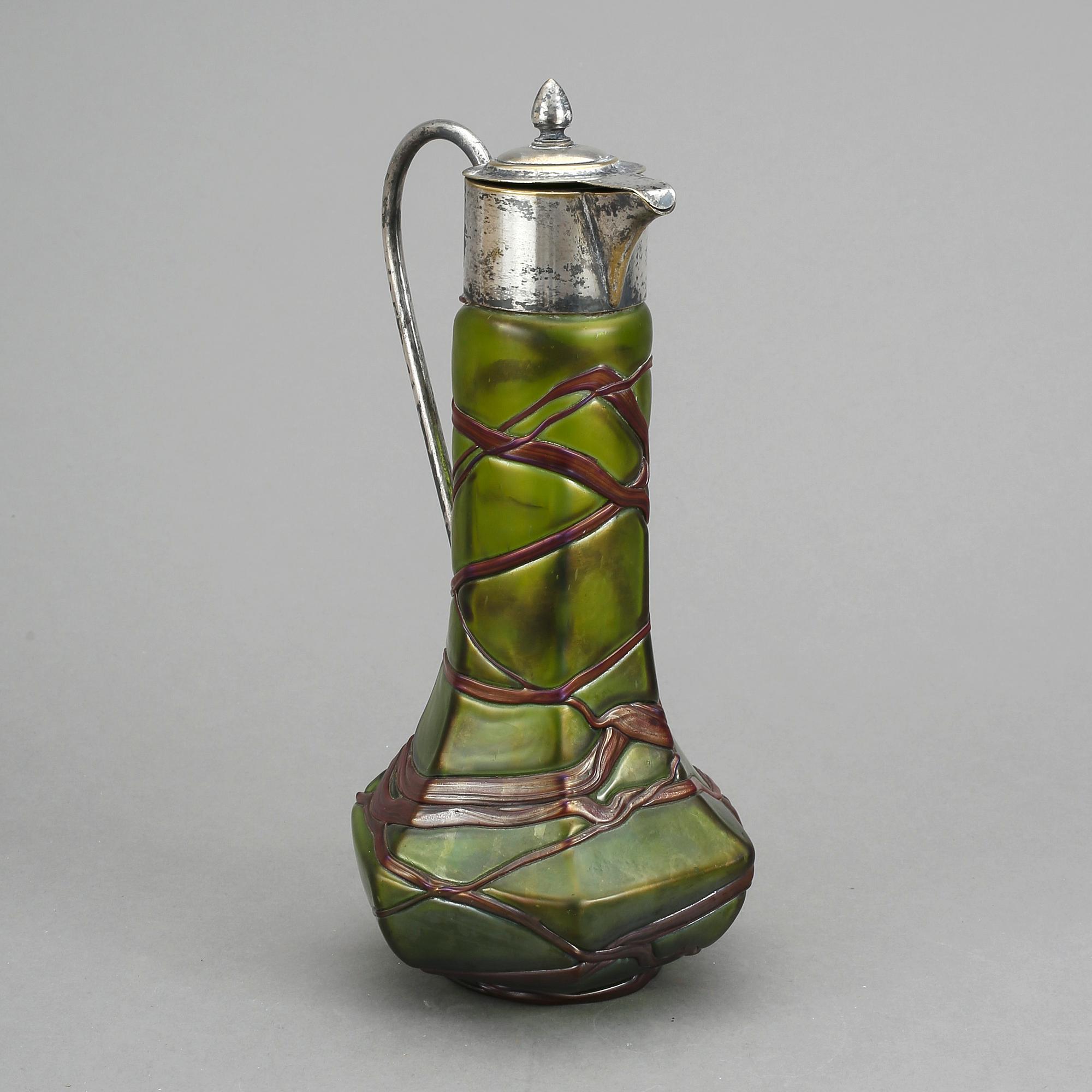 KANNA, jugend, nysilver samt glas, 1900-talets början. Sannolikt Lötz, Österrike.
