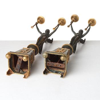 A pair of Empire-style 20th century candelabra.
