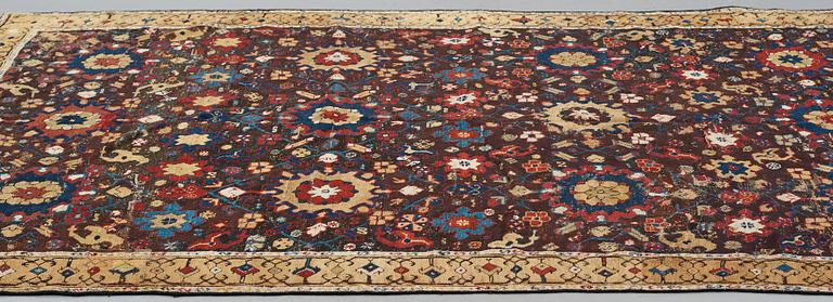 A CARPET FRAGMENT, an antique Karabagh 18th century, ca 293-300,5 x 202,5-205,5 cm.