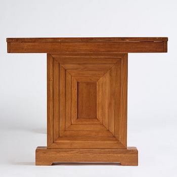 Oscar Nilsson, attributed to, a stained oak table, probably executed at Isidor Hörlin AB, Stockholm, 1930-40's.