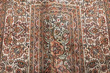 A carpet, silk Kashmir, ca 303 x 216 cm.