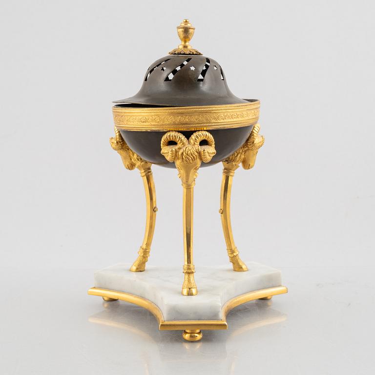 A French Empire ormolu and patinated bronze brûle-parfum, early 19th century.