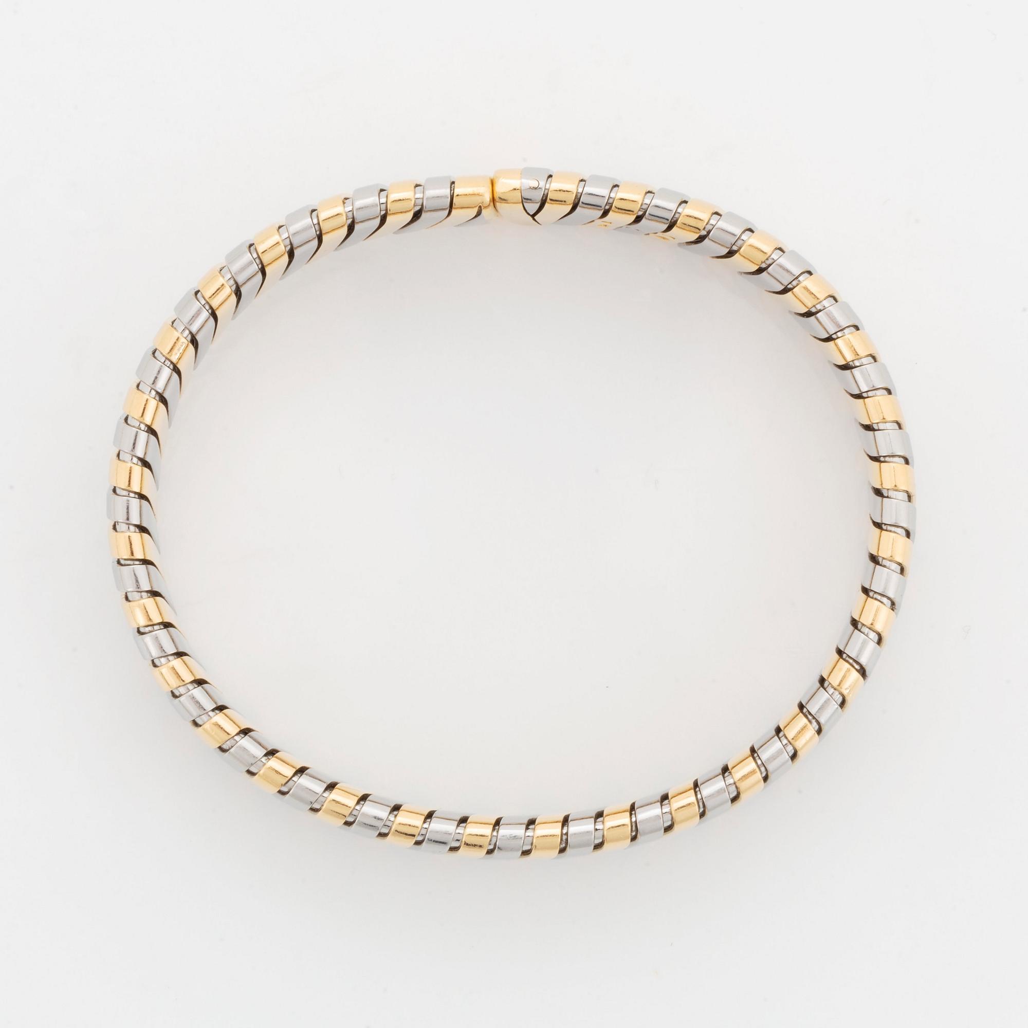 A Bulgari "Tubogas" bracelet in 18K gold and steel.