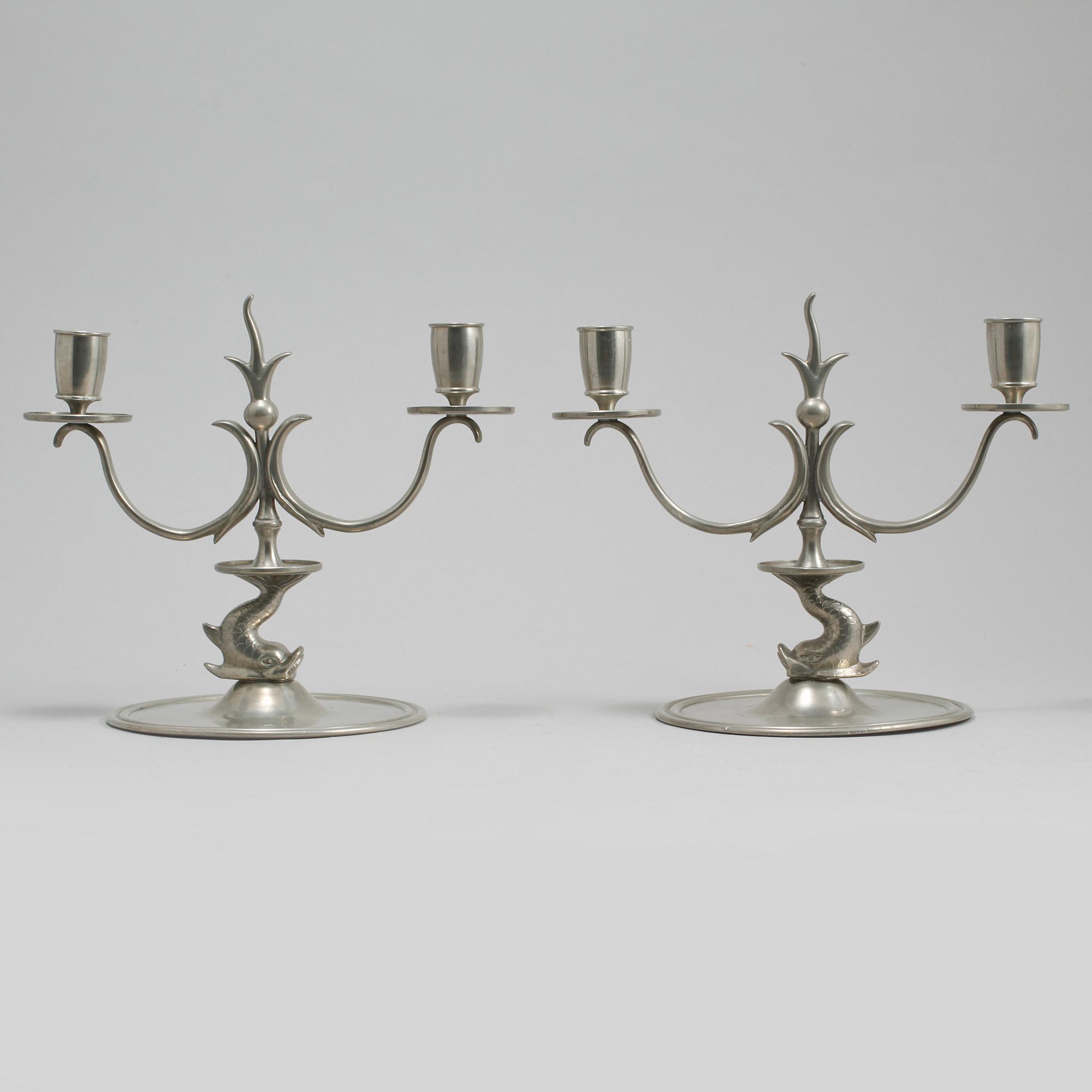 LJUSSTAKAR, ett par, tenn, Firma Svenskt Tenn, Stockholm, 1927.