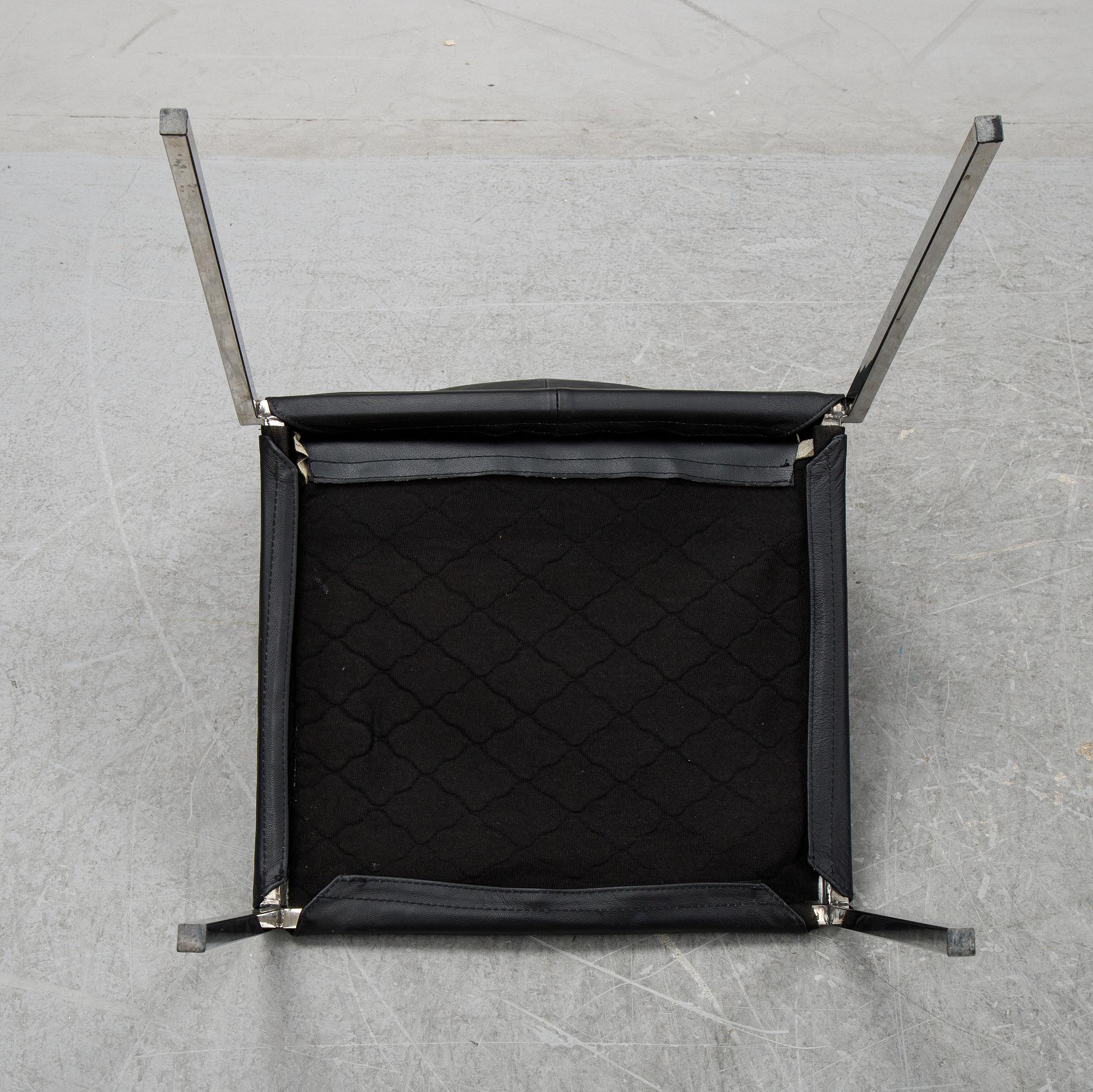 A set of eight steel and leather chairs, 21th century.