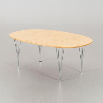 An end of th 20th century coffee table by Bruno Matsson & Piet Hein.
