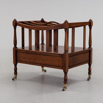 A mahogny newspaper stand (so called Canterbury), England, late 20th century.