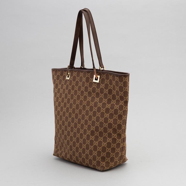 Gucci, a monogram canvas handbag.