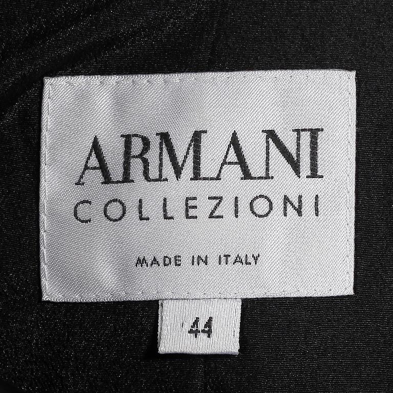ARMANI, a two-piece suit consisting of a jacket and trousers.