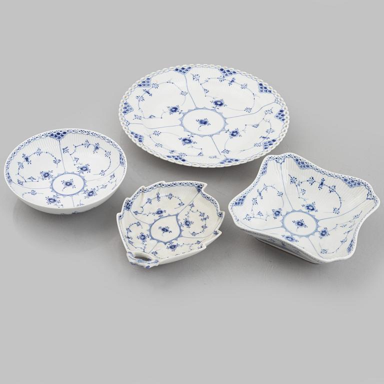 Royal Copenhagen, a 116-piece 'blue Fluted' porcelain dinner and coffee service, half lace, Denmark, mostly 1923-34.