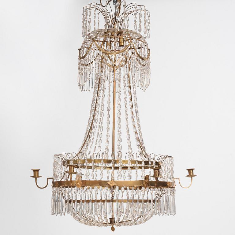 A late Gustavian gilt brass and cut glass seven-light chandelier, Stockholm, late 18th century.