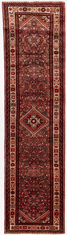A runner  carpet, Hamadan, 305 x 80 cm.