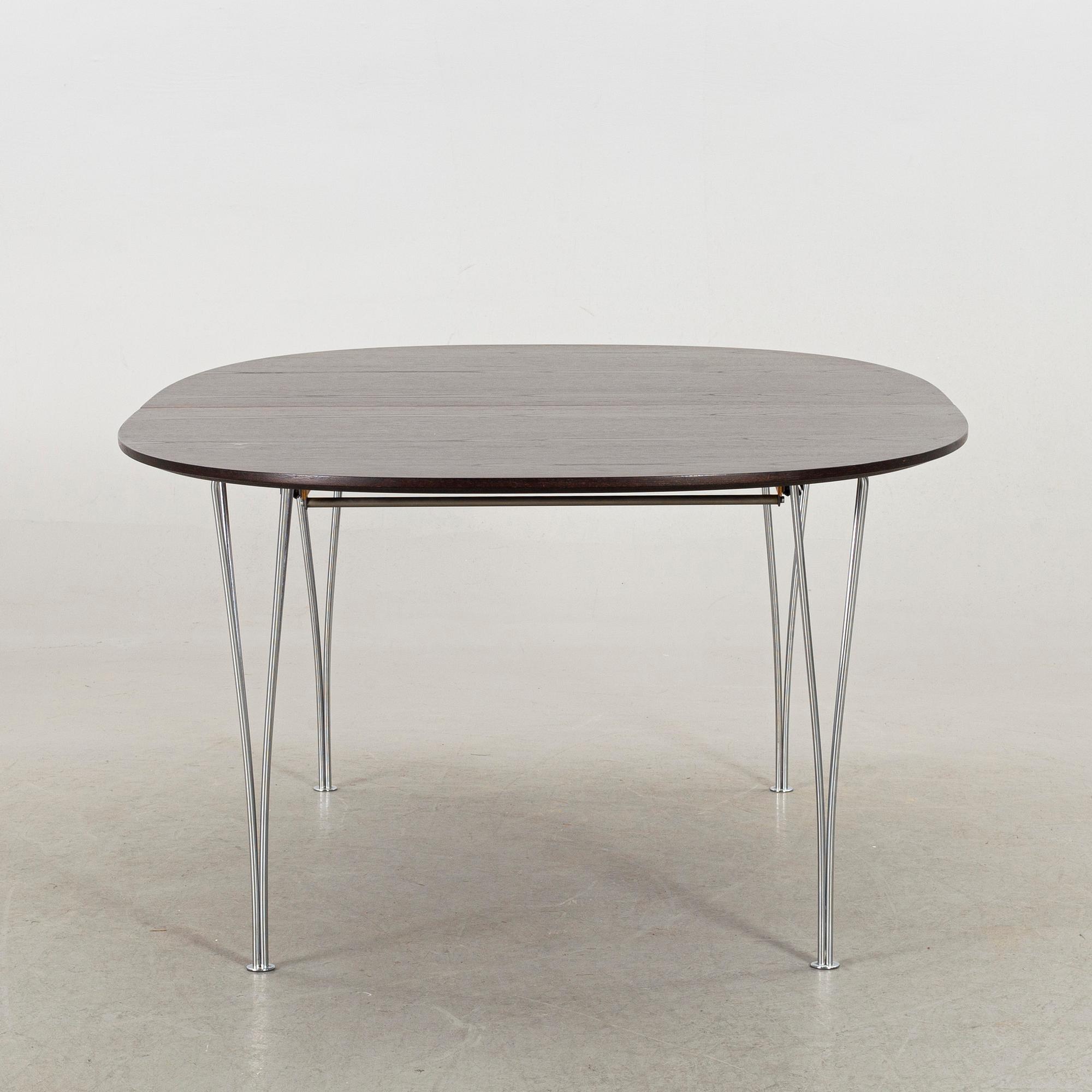 A SUPERELLIPS TABLE IN WENGE. BRUNO MATHSSON AND PIET HEIN for FRITZ HANSEN.