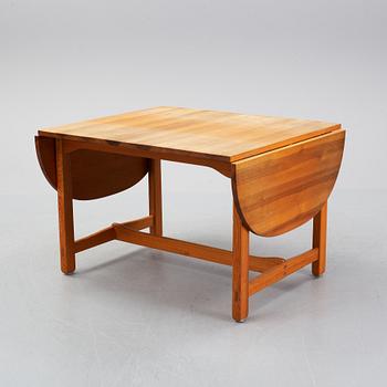 Carl Malmsten, a pine dining table and 6 chairs.