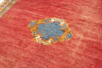 A North African carpet, c. 294 x 198 cm.