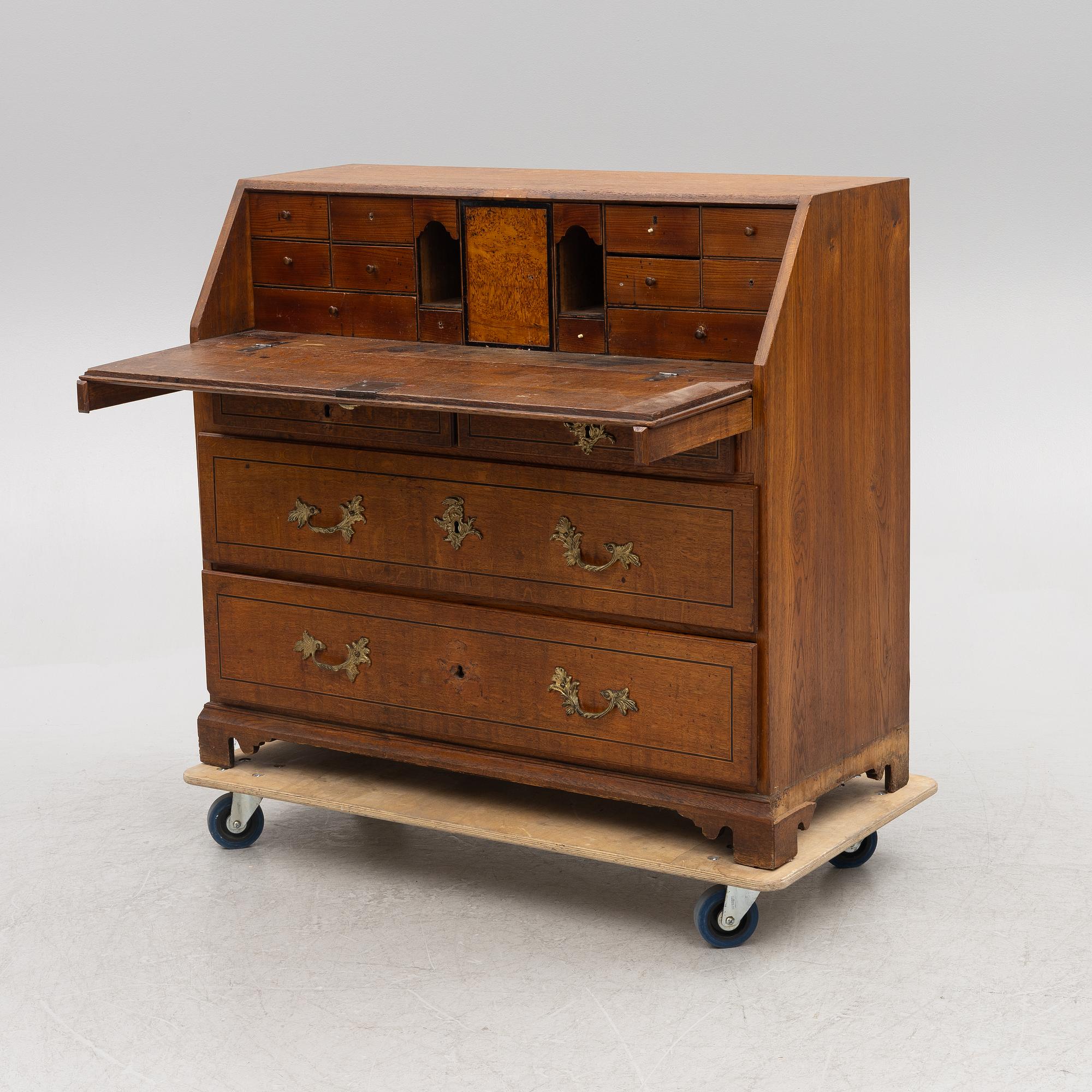 An oak secretaire, first half of the 19th century.