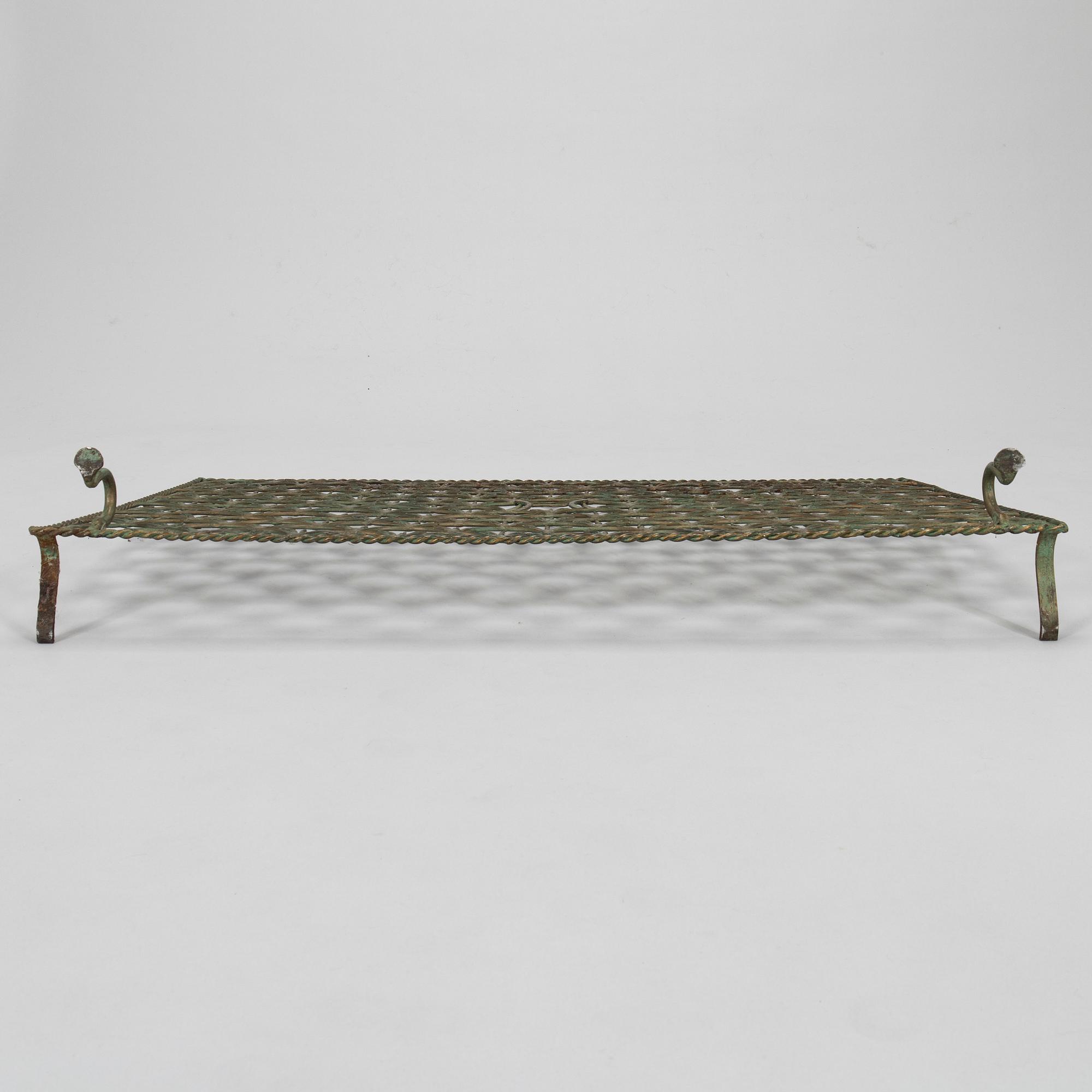 A radiator cover, metalwork, likely Taidetakomo Hakkarainen, 1930s.