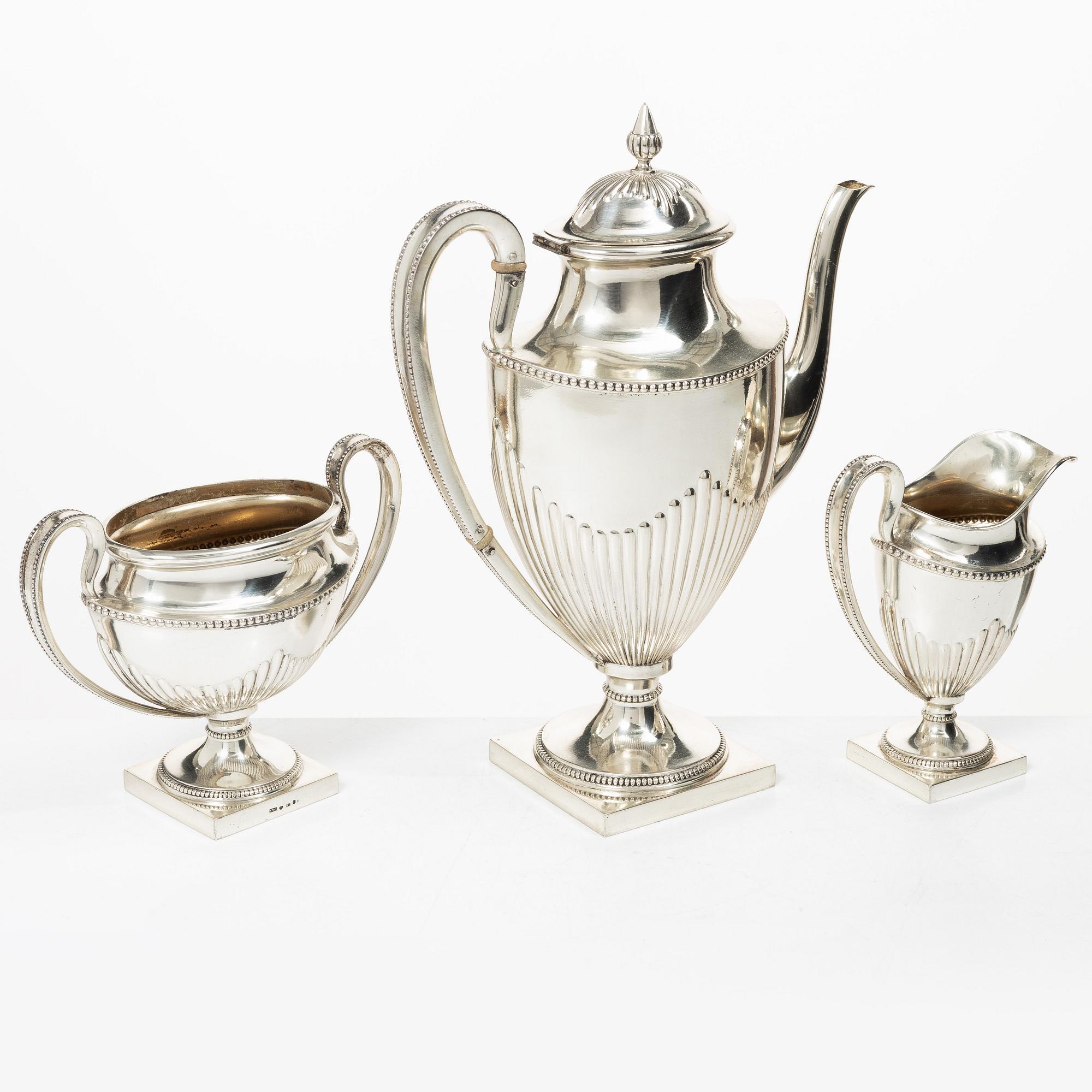 Guldsmedsaktiebolaget (GAB), A Swedish silver Gustavian style coffee pot, creamer and sugar bowl, Stockholm 1910.