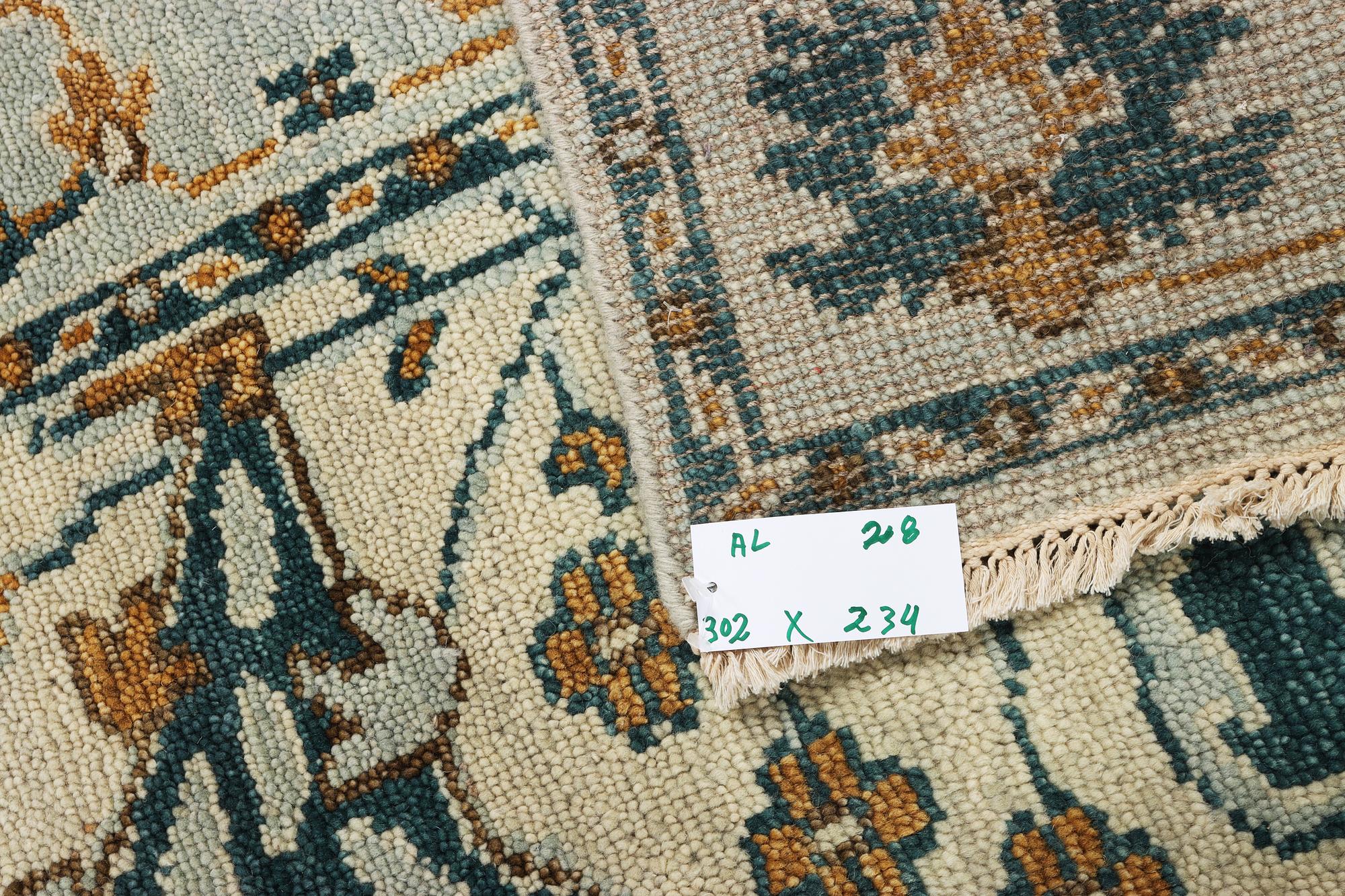 An oriental carpet with Mamluk design, c. 302 x 234 cm.