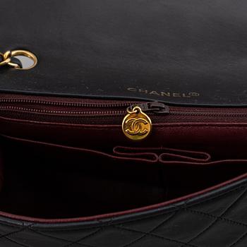 Chanel, a quilted leather 'Flap' bag, 1989-91.