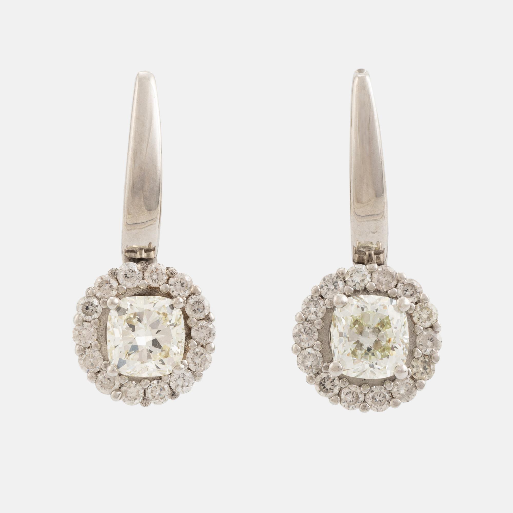 Cushion cut diamond earrings.