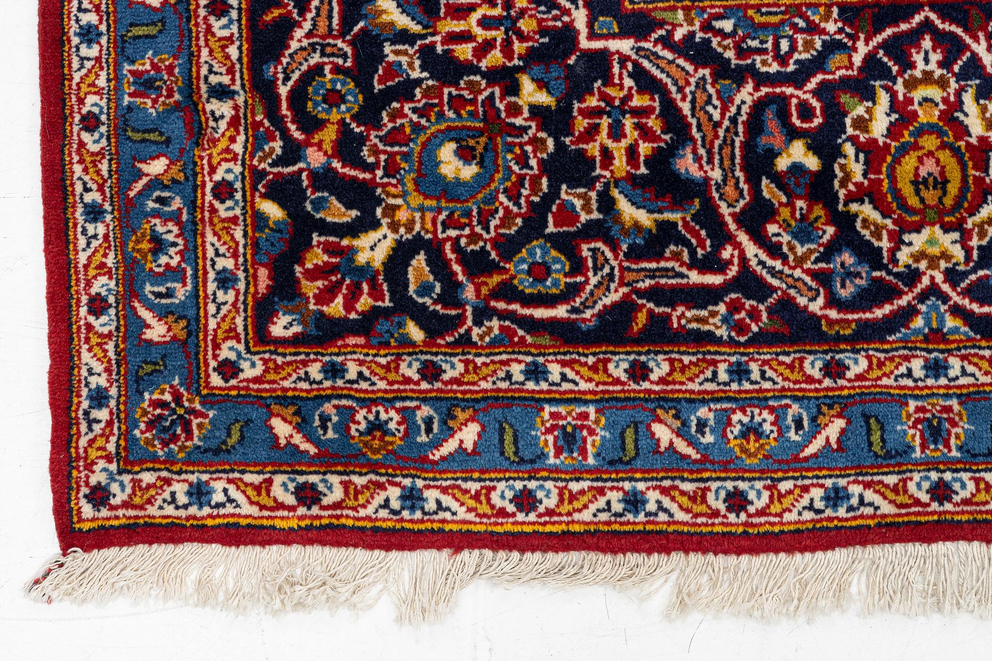 An oriental carpet, c. 340 x 240 cm.