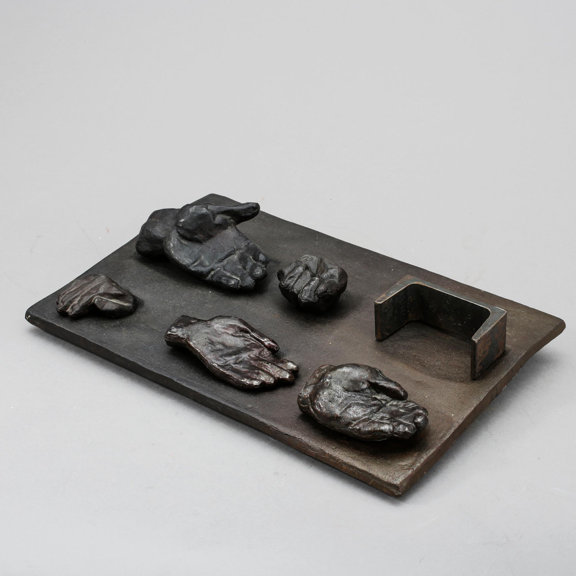 TORSTEN RENQVIST, gjutjärn i 7 delar. Signerad T.R och daterad -68 och numrerad 16/30.