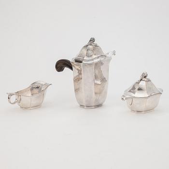 Jacob Ängman, a silver coffee pot, creamer and sugar bowl, GAB, Stockholm 1929.